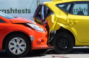 Person reviewing car accident documents for pain and suffering calculation