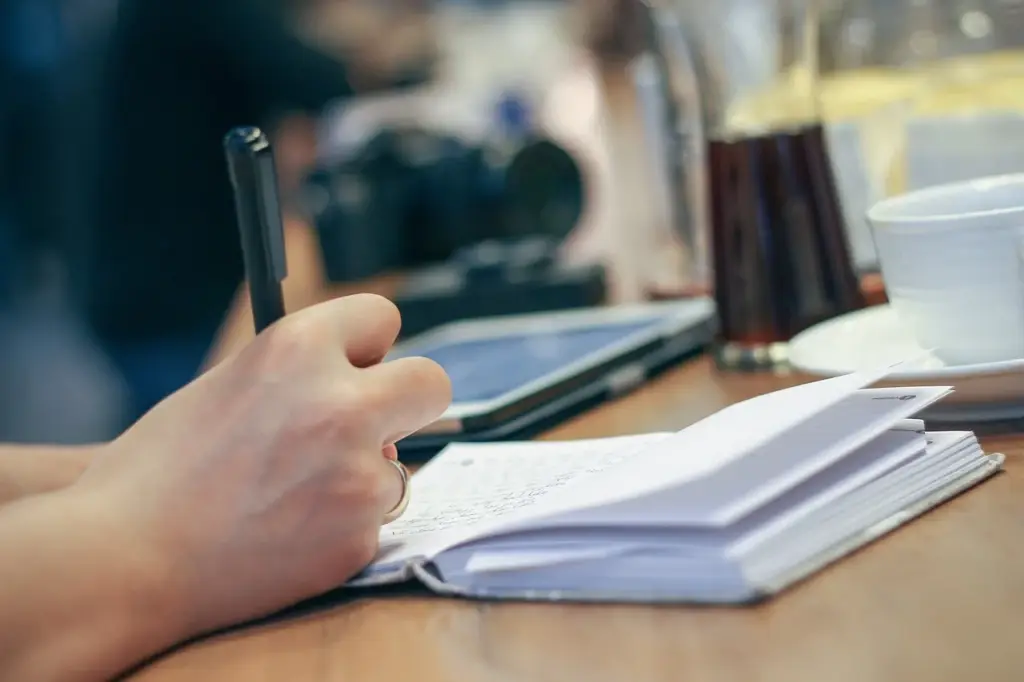 Writing in a pain and symptom journal after a car accident