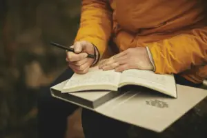 Person reading an insurance settlement offer letter